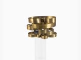 brass and clear glass candle holder with four rings on the top