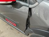 a close up of a car with its door open