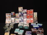 many different types of cigarettes on a black table
