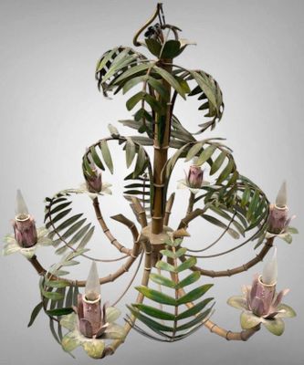 a chandelier that has a bunch of flowers on it