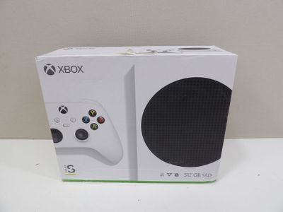 the box is white and has a black game controller inside of it