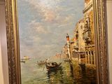 a picture of a painting hanging on the wall