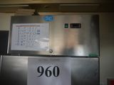 a sign on the refrigerator that says it is 900