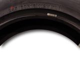 an image of a close up of a tire on a white background