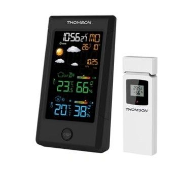 une horloge équipée d'une station météo, avec une station météo placée devant