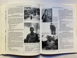 an open book with pictures of military men on it