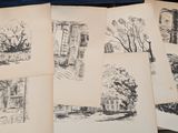 several drawings of a house and trees are shown on a table