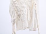 an image of a white shirt hanging on a black hanger