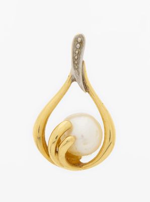 a close up of a gold and pearl pendant on a white background