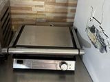 a toaster oven sitting on a counter in a kitchen