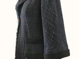 an image of a woman ' s coat on a mannequin