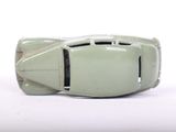 a toy car that is sitting on a white surface