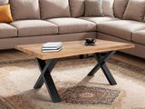 a coffee table with a book on it in a living room