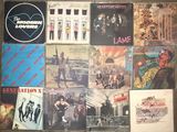 a lot of different albums on the floor together