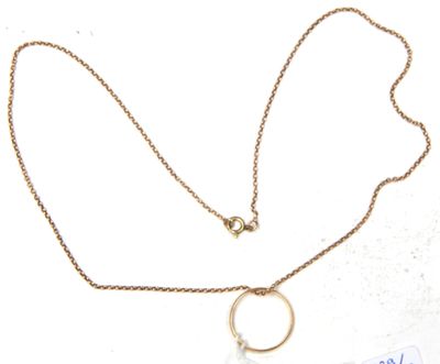necklace with a gold chain and a pearl pendant on a white background