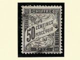 une vieille photo en noir et blanc d'un timbre sur lequel on peut lire « 50 centimes »