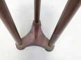 an image of a wooden table with two legs