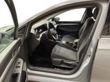 the interior of a car with the door open and the driver ' s seat down