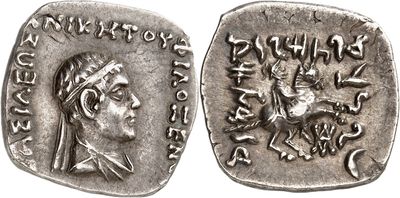 a silver coin with an image of a man on a horse