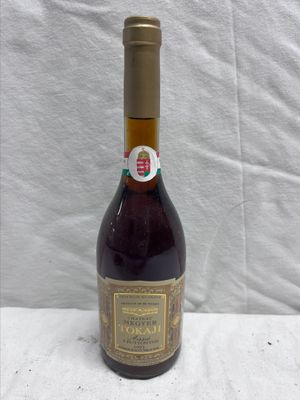 a bottle of wine that is sitting on a table