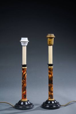a pair of table lamps in tortoise shell and brass