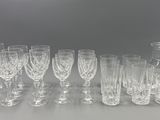a lot of empty wine glasses sitting on a table