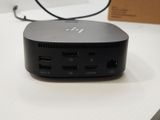 an image of a small black device on a table
