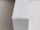 a close up of a white box on a table
