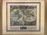 an old map of the world is displayed in a gold frame