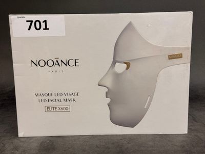 an image of a box with a white mask on top of it