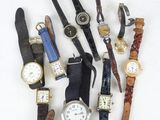 a lot of watches that are sitting together on a table