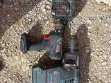 two tools that are laying on the ground