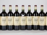 six bouteilles de vin rouge alignées