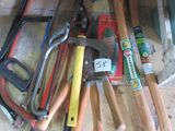 many different types of tools that are laying on the floor