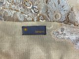 an image of a label on the back of a dress