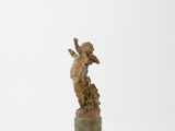 an image of a statue of an angel on a pedestal