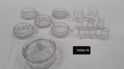 a lot of glass items that are on the table