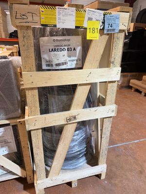 a pallet with a lot of items on it in a warehouse