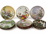 six plates with different designs on them on a white surface