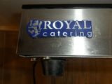a sign that says royal catering hanging from the ceiling