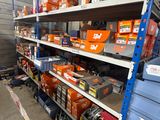 many shelves in the garage with tools on them