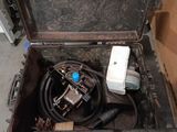a box with a hose and a hose in it