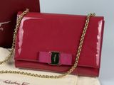 red purse with a gold chain and a red purse with a gold chain and a red purse with a gold chain and a red purse with a gold chain and a
