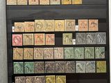 a picture of a collection of stamps on display in a museum
