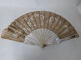 a fan that is sitting on a white table
