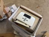 a box that has a small electronic device inside of it