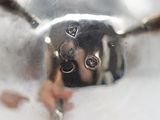 a close up of a spoon and fork in a bowl