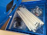 a box with a bunch of white sticks inside of it