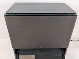 a close up of a microwave oven on top of a table
