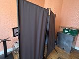 a room that has a screen in the middle of it